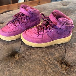 Burgundy suede children’s high top Nikes. Barely worn. Unisex. Size 11c.